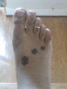 feet tat